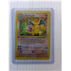Image 2 : (3) Minions Figurines, Charizard Pokemon Card- Cannot Authenticate & Stickers