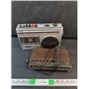 Image 1 : Lloyd's Super Sensitive Radio Cassette Recorder, Sanyo AM/FM Radio Alarm, Powers On, No Cord, As Is