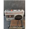 Image 2 : Lloyd's Super Sensitive Radio Cassette Recorder, Sanyo AM/FM Radio Alarm, Powers On, No Cord, As Is