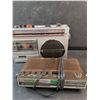 Image 3 : Lloyd's Super Sensitive Radio Cassette Recorder, Sanyo AM/FM Radio Alarm, Powers On, No Cord, As Is