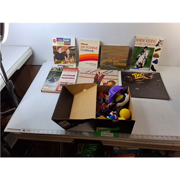 (2) Records- TKO & Jane Fonda, (4) Books- Horse Riding, Microwave Cookbook, The Road to Hyundai, Mis