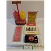 Image 1 : Coca-Cola Memorabilia (Condiment Bottles - NIB, Camera, Tin, Lapel Pins, Menu Card