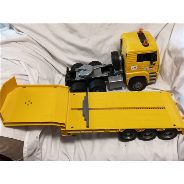 Large man flat deck truck