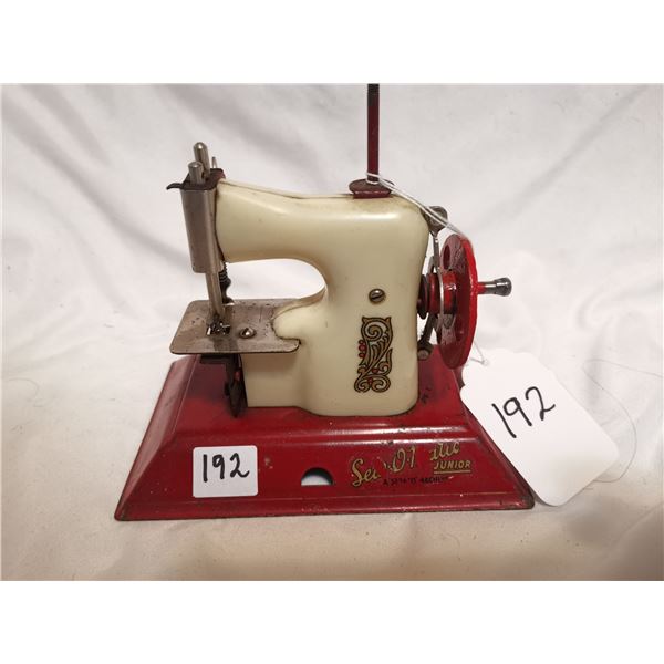 Sew-o-matic child sewing machine