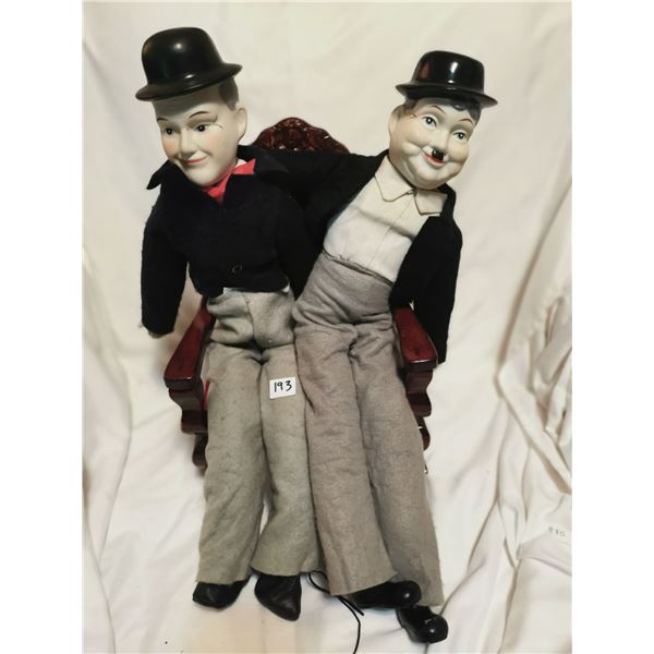 Loren, hardy porcelain dolls in red chair