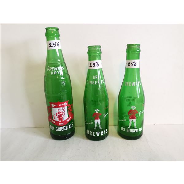 3 drewrys RCMP bottles