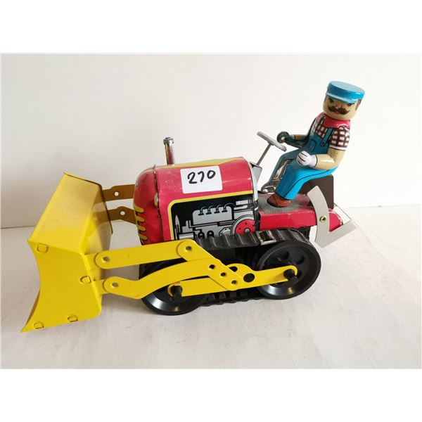 Toy tin tractor
