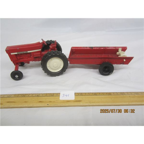 Ertl International Tractor with Manure Spreader Attachment