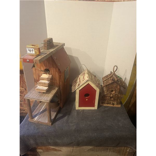 3 wooden bird houses