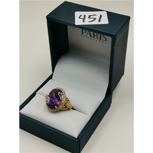 Sterling silver ring , purple stone