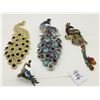 Image 1 : Four peacock broaches