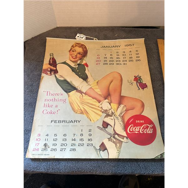 Coca cola calender 1957 good condtion for age -15"x17"