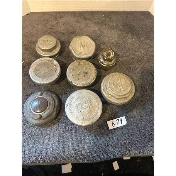 8 vintage small hub caps- pontiac, chev, ford etc