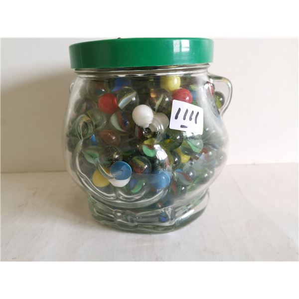 Peanut butter jar full of marbles