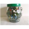 Image 1 : Peanut butter jar full of marbles