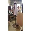 Image 1 : 2 HEAVY METAL PATIO UMBRELLA STANDS