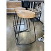 Image 2 : 2 WOOD SEAT SADDLE STOOLS