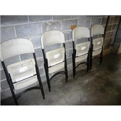 WHITE PLASTIC FOLDING CHAIRS