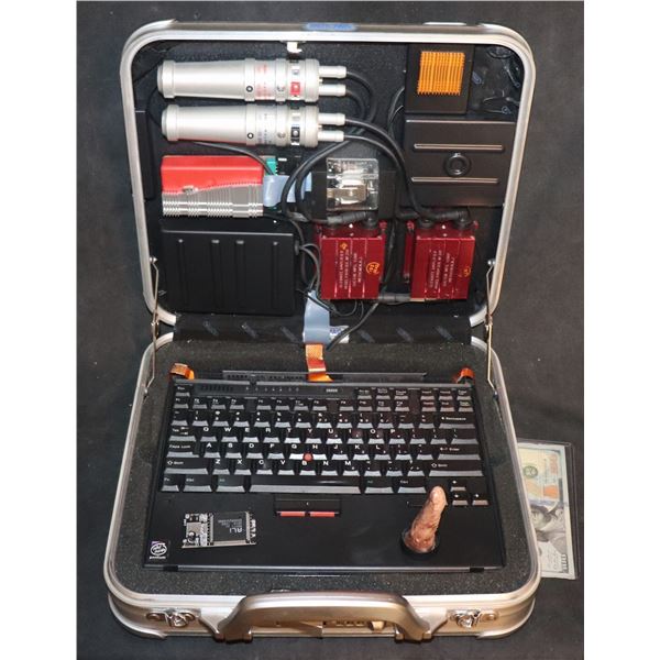 SOUTHLAND TALES NEO MARXIST BRIEF CASE BOMB WITH SEVERED THUMB TO SCAN