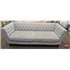 Image 1 : FIXTURE : Beige Tufted High Sided Couch