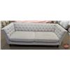 Image 1 : FIXTURE : Beige Tufted High Sided Couch