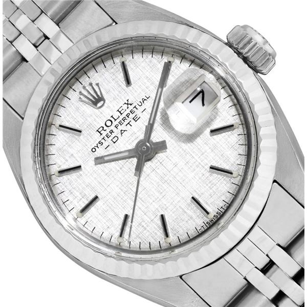 Rolex Ladies Stainless Steel 14K Fluted Bezel Date Watch