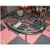 Image 1 : CAST IRON + TEMPERED GLASS TOP OVAL COFFEE TABLE