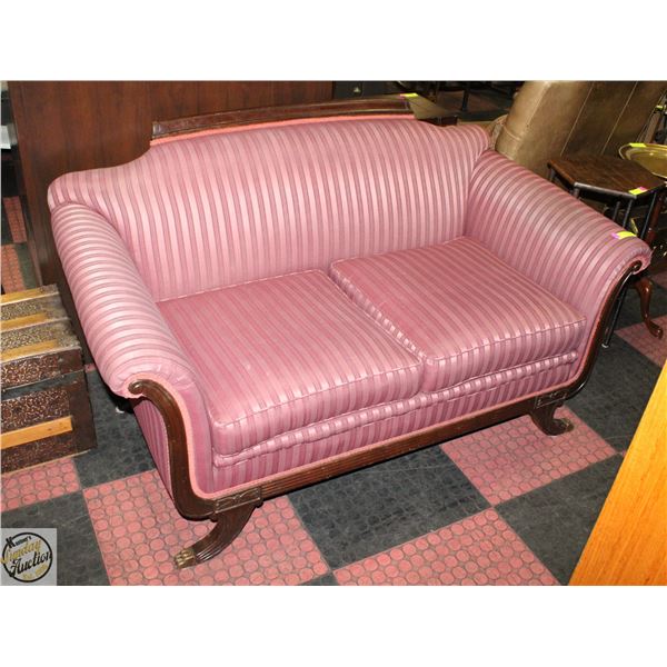 CLAWFOOT UPHOLSTERED LOVE SEAT ON WOODEN FRAME