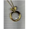 Image 2 : Gold Tone Apple Magnifying Glass Necklace