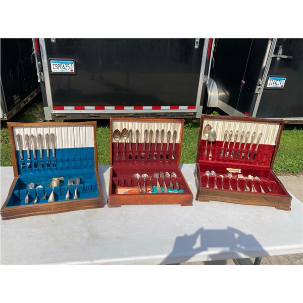 SILVERWARE SETS IN WOODEN STORAGE BOXES; LOT OF 3