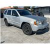 Image 2 : JEEP  GD CHEROKEE 2010 SALV T/DONATION