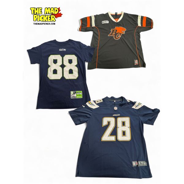 3x Sports Jerseys (NFL & CFL): Bc Lions Size XL, Seattle Seahawks Nike Size Large Gordon #28, & Maje