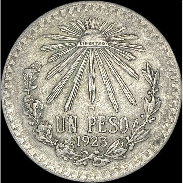 1923-M Mexico Silver Silver Peso NEARLY UNCIRCULATED