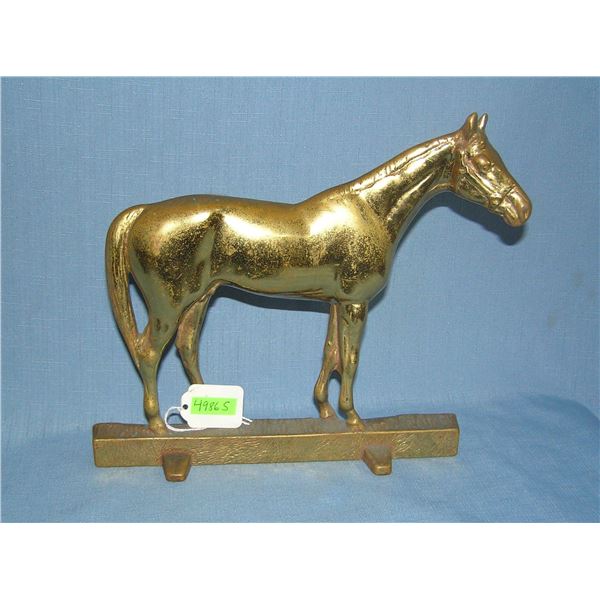 Solid brass horse doorstop marked CRK 1949