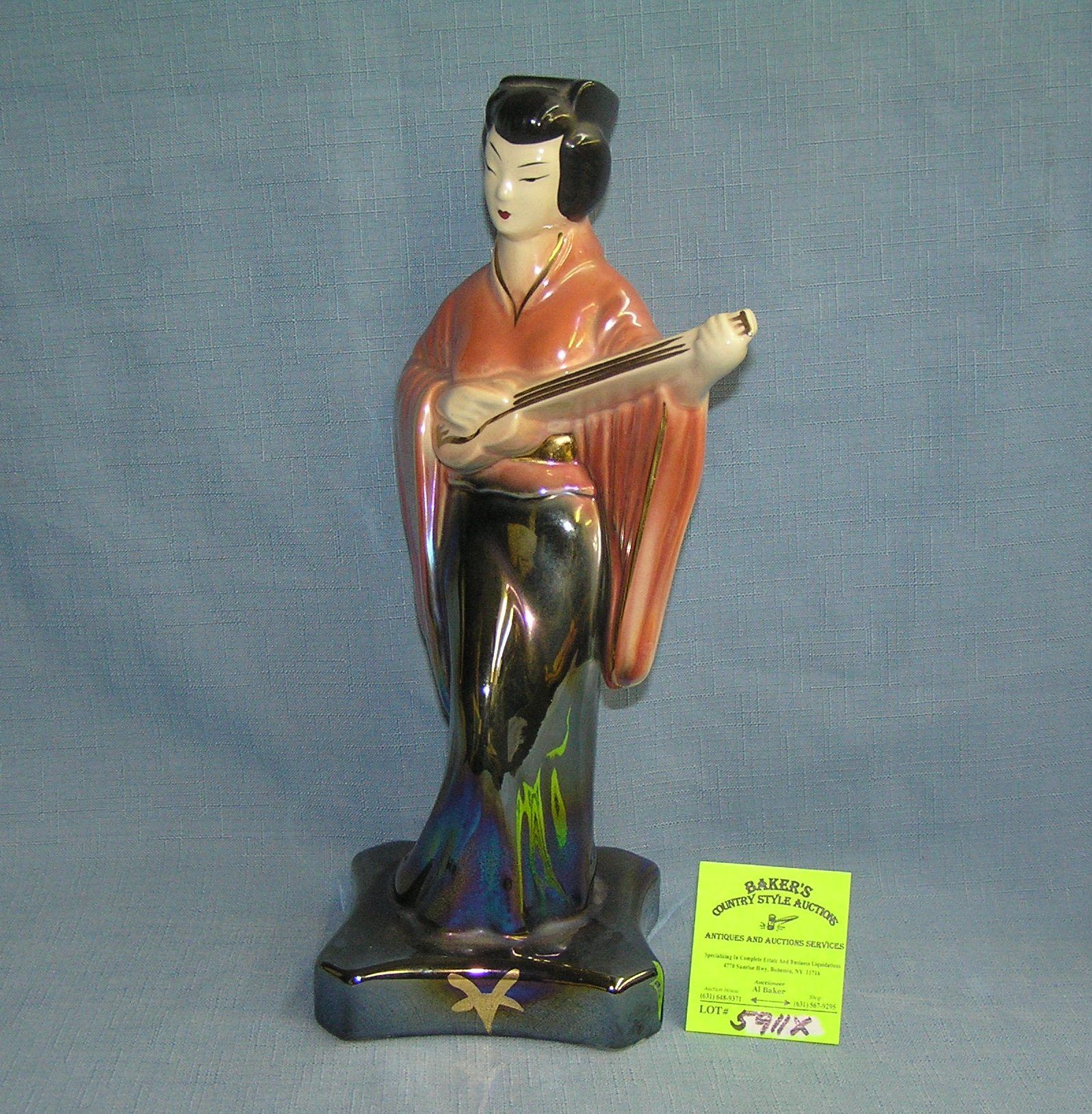 Stringed Instrument Figure Eight Body Oriental female stringed instrument playing figure