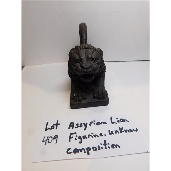 409.  ASSYRIAN LION FIGURINE UNKNOWN COMPOSITION