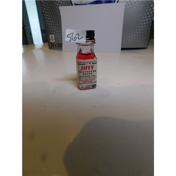 562.  JIFFY TOOTH ACHE DROPS, CONTENTS AND BOTTLE
