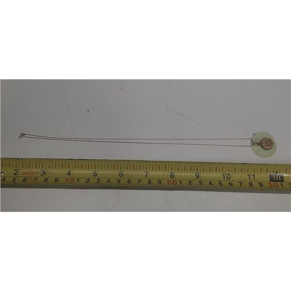 10 KT Gold (Stamped) Fine Chain in Pendant.