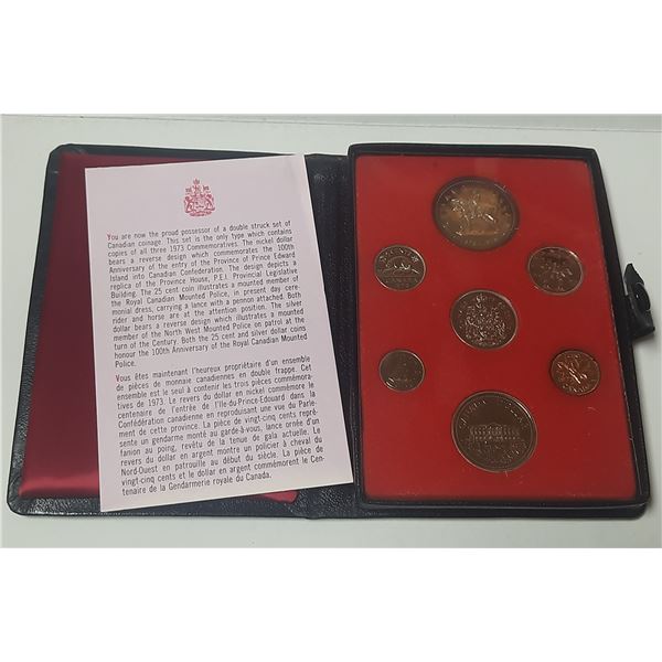 1973 Double Dollar 7-coin Prestige Specimen set. The Silver Dollar is beautifully toned. Housed in i