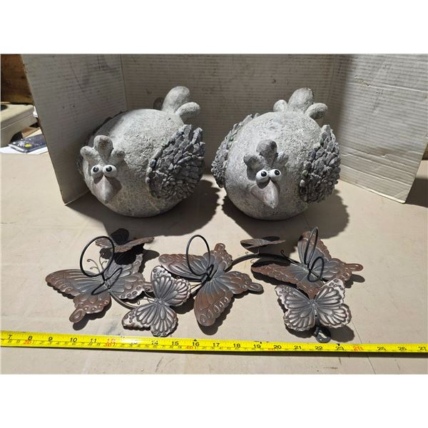 2 garden statues and candle holder