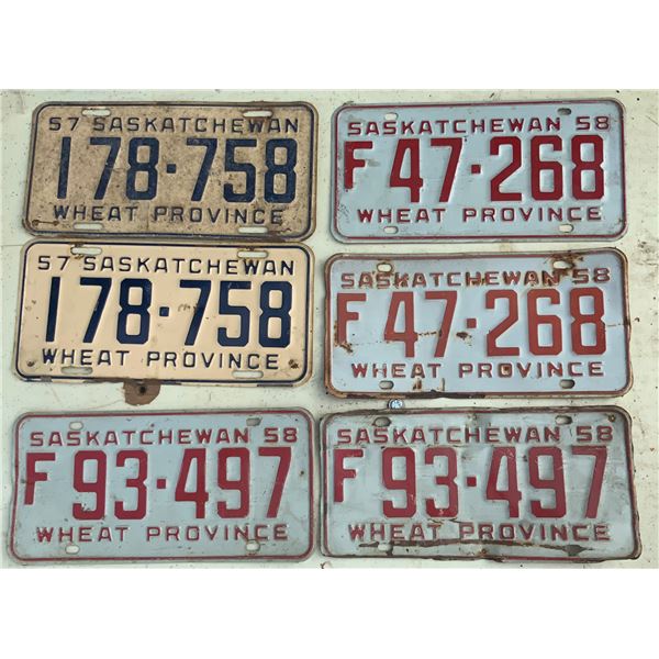 Three Sets of Matching License Plates. 1957 and two 1958