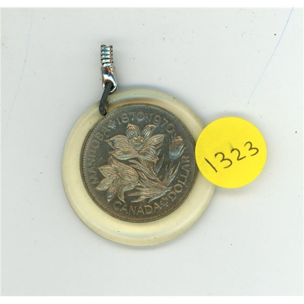 1870 – 1970 Canadian Nickel Dollar. Housed in a mylar for use as a Key Chain. Unc.