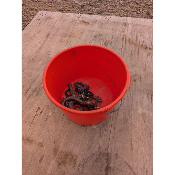 Orange Bucket Full of Shackles