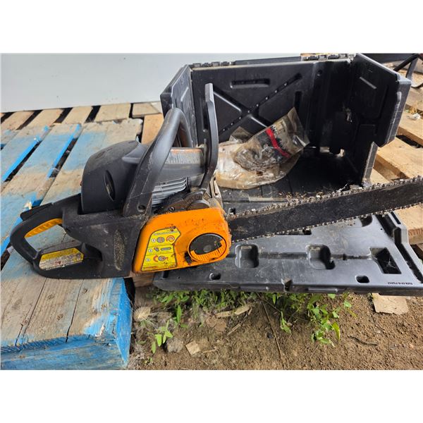 Chainsaw with carry handle in a portable case