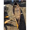 Image 1 : Tremblay 14fT Wooden canoe- with paddles-  Apache written on side