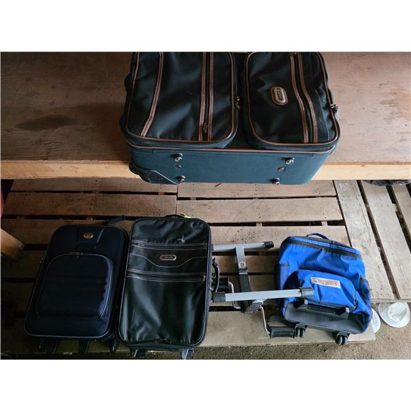 5 suit cases and foot pedal exercise machine