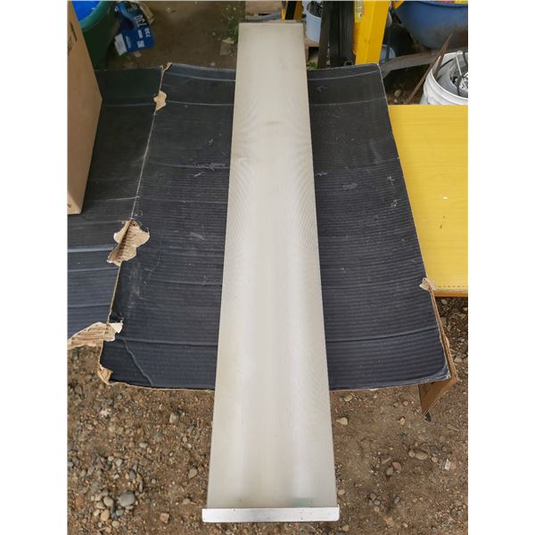 Fluorescent light fixture lens