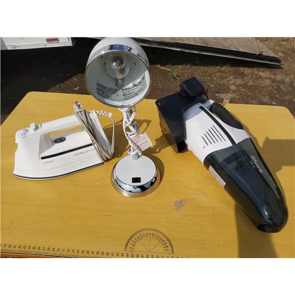 Philips iron, desk lamp, Shark handheld vacuum