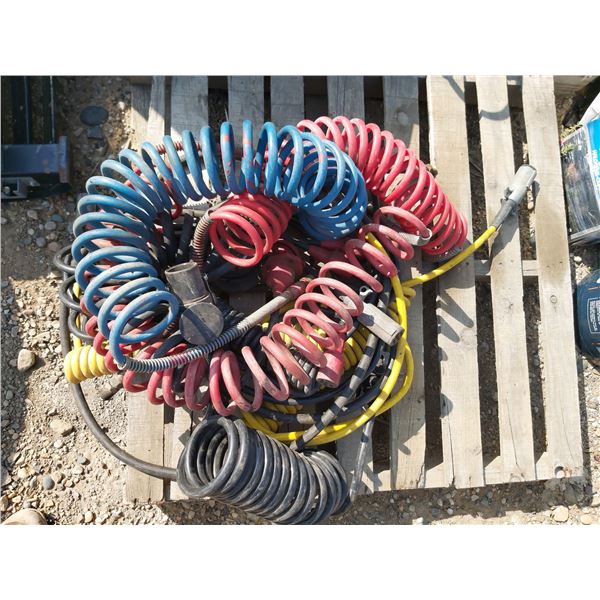 Lot of misc. cables (Tractor-trailer air and electrical lines)