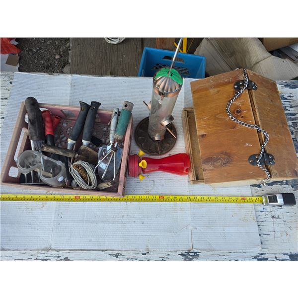 Lot of gardening tools and bird feeders